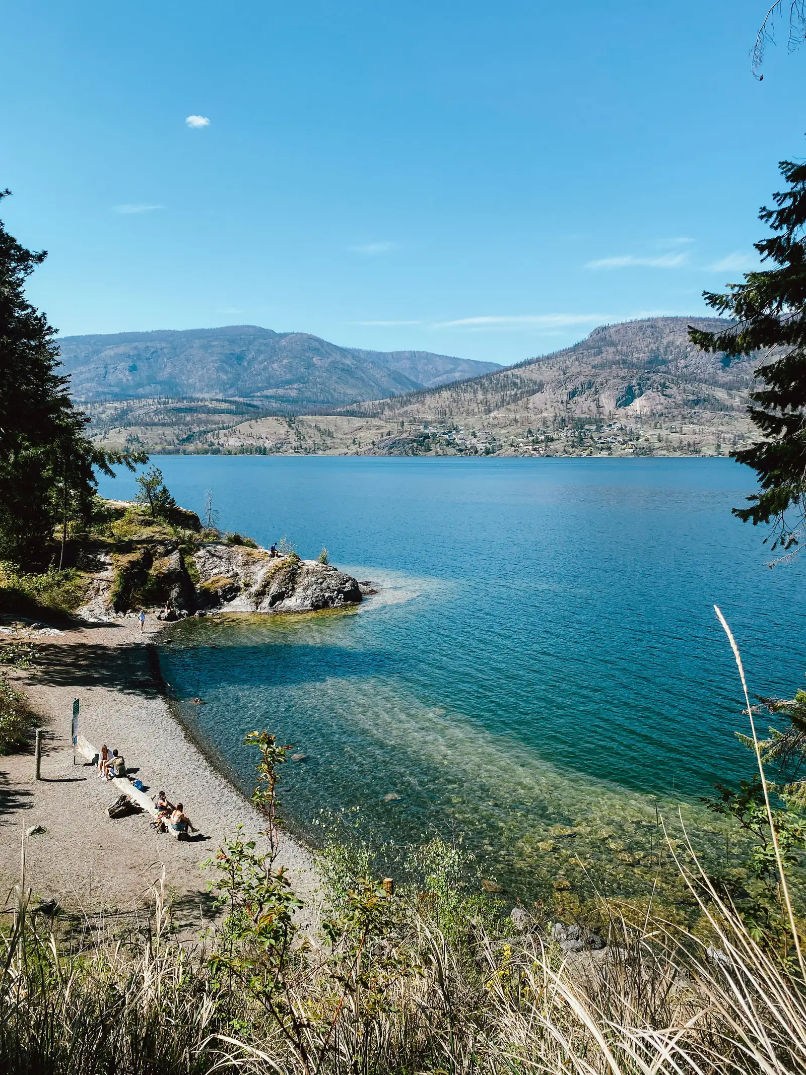 Turquoise water and a rocky point on Okanagan Lake near Kelowna